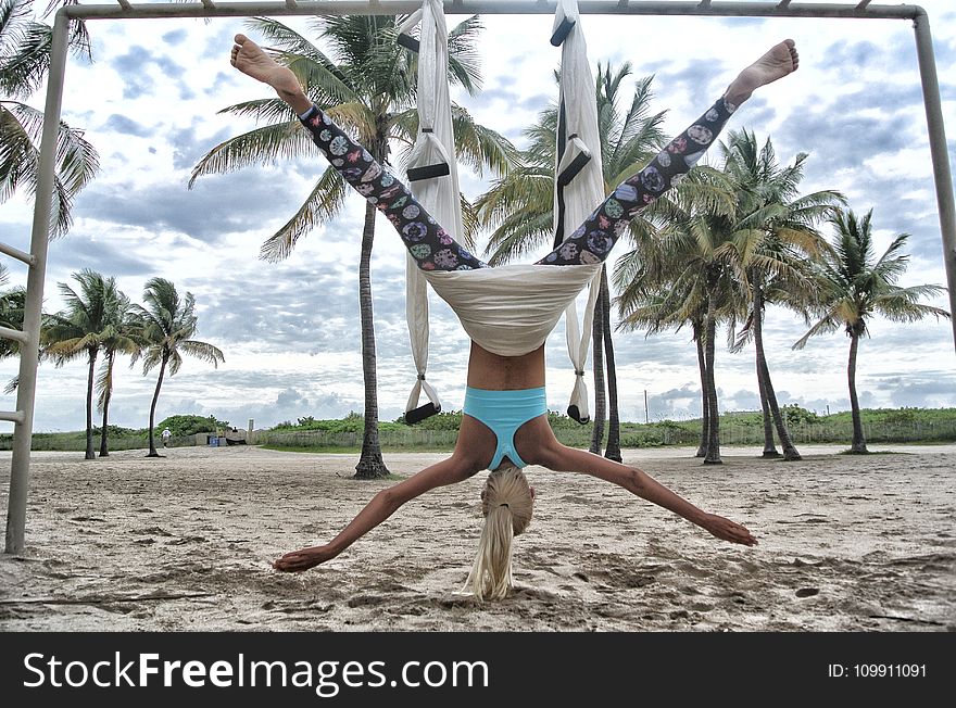 Woman Doing Anti-Gravity Yoga