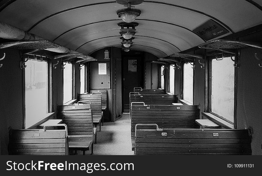 Grayscale Photo Of Chairs