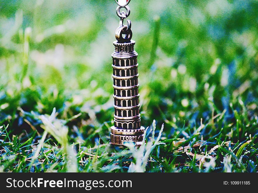 Leaning Tower of Pisa Pendant on Green Grass at Daytime