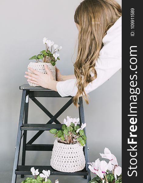 Woman Taking Care Plants