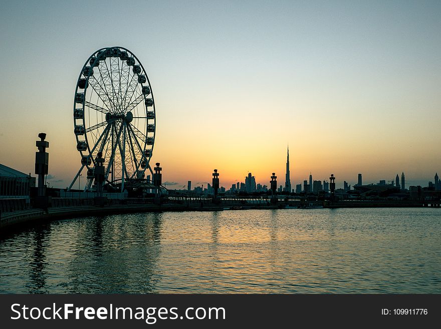 Black Ferris Wheel Near Body of Water
