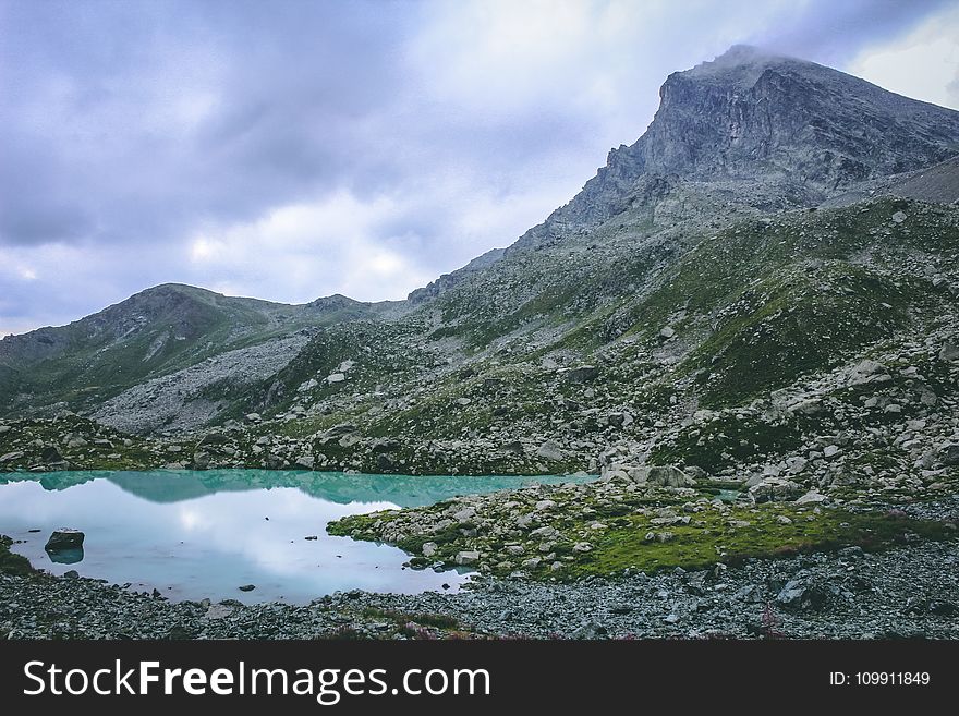 Mountain Near Body of Water