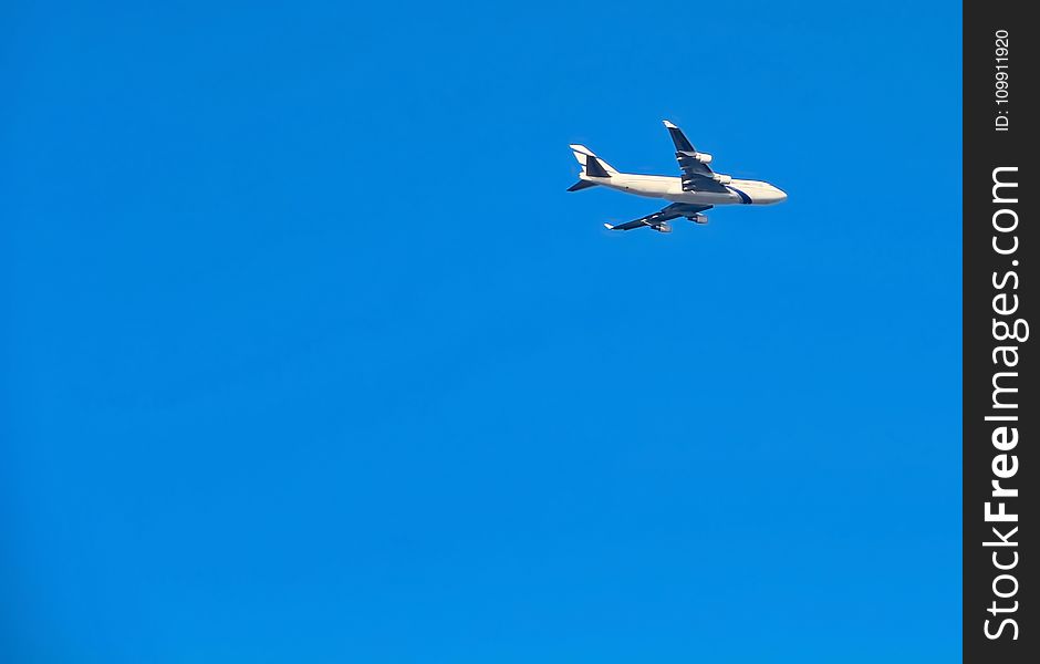 Timelapse Photography of White Passenger Plane in Sky