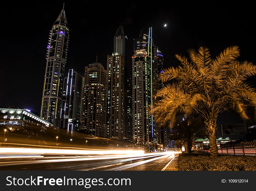 Timelapse Photo Of High Rise Concrete Buildings