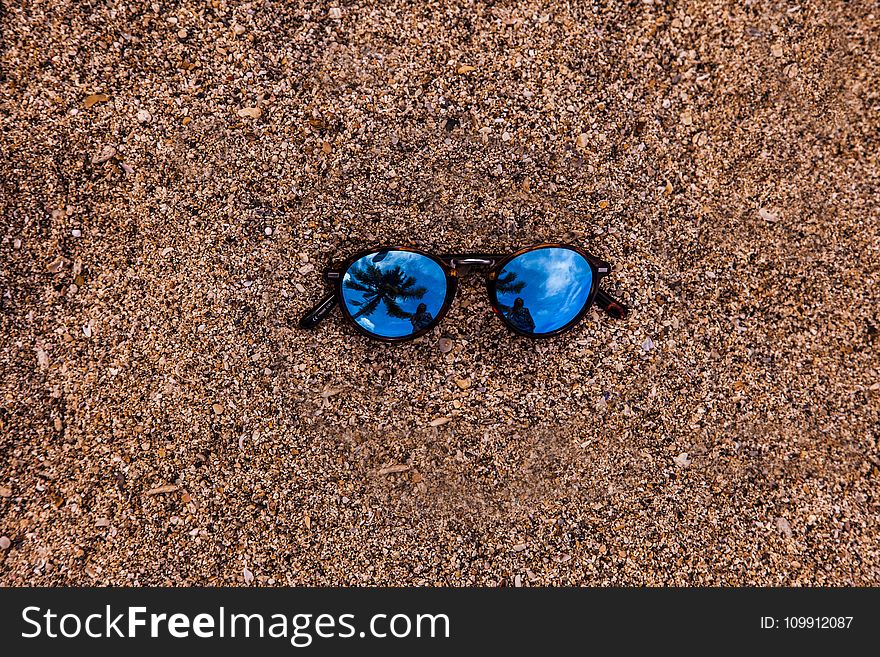 Photo Of Sunglasses In The Ground