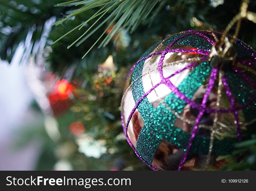 Close Up Photo of Gray and Multicolored Bauble