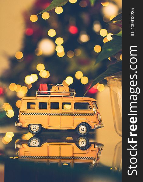 Macro Shot Photography Of Brown Volkswagen Van Figure On Table