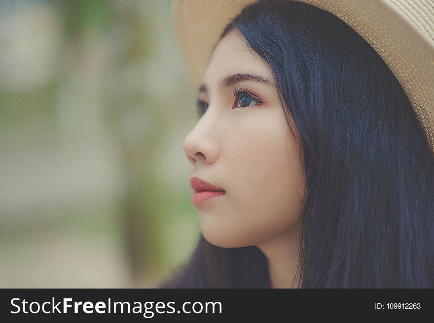 Woman Wearing Brown Fedora Hat