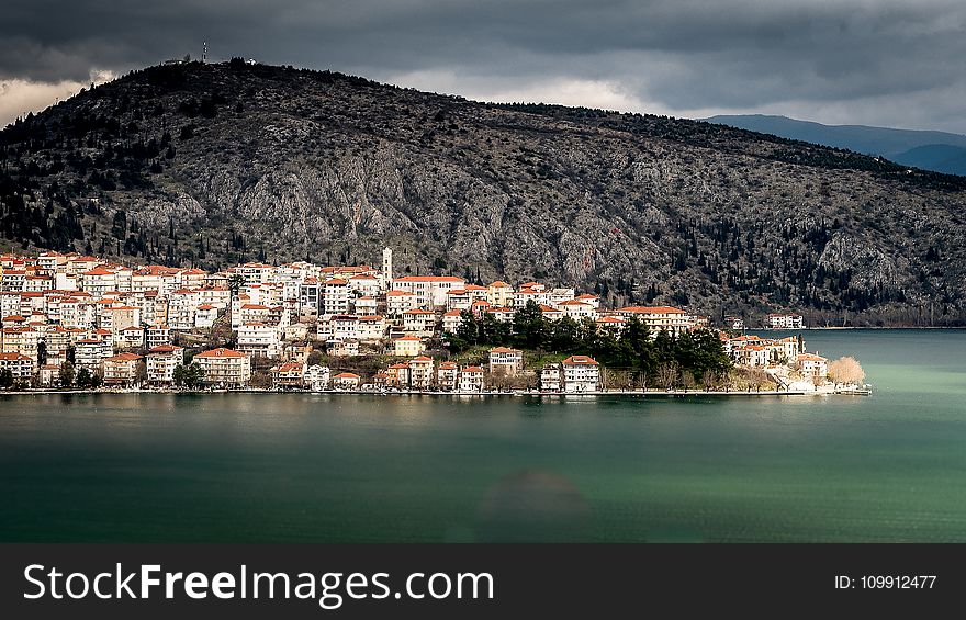 Photo Of Concrete Houses Near The Sea