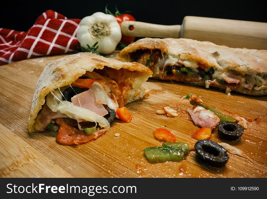 Cooked Food Served On Brown Wooden Board