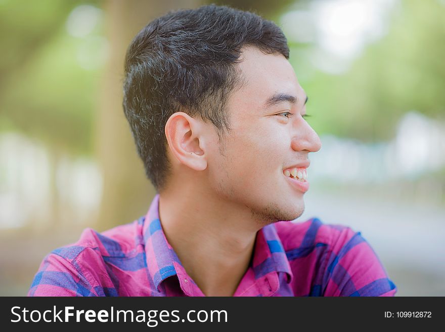 Man Facing Side on Selective Focus Photography