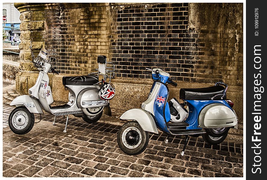 White and Blue Scooter Motorcycles
