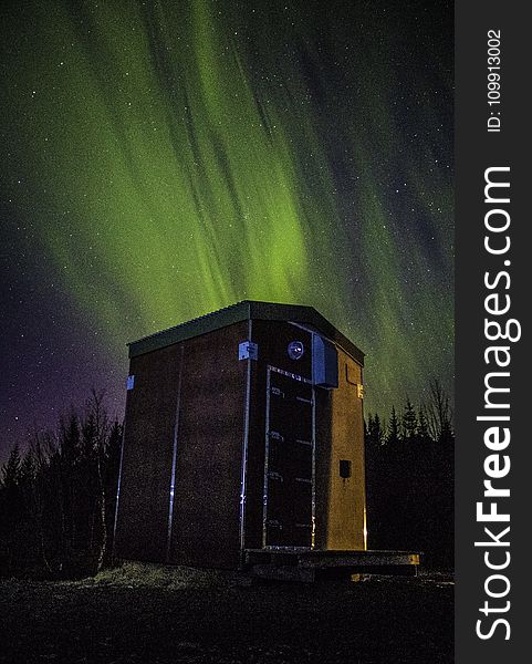 Photo Of Wooden Shed Under Northern Lights