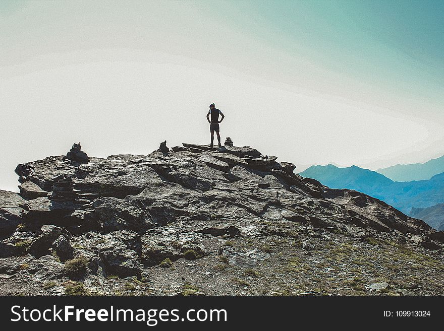 Person Standing on the Cliff