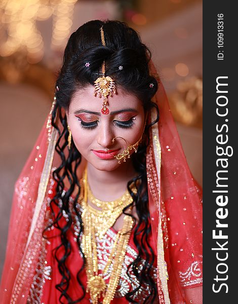 Selective Focus Photography of Woman Wearing Traditional Dress With Gold-colored Accessories