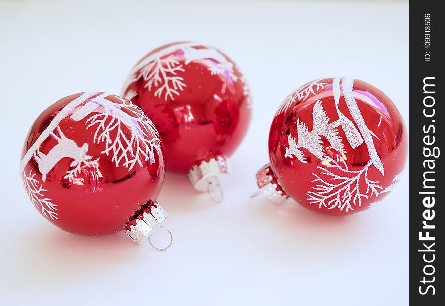 Three White-and-red Christmas Tree Printed Baubles