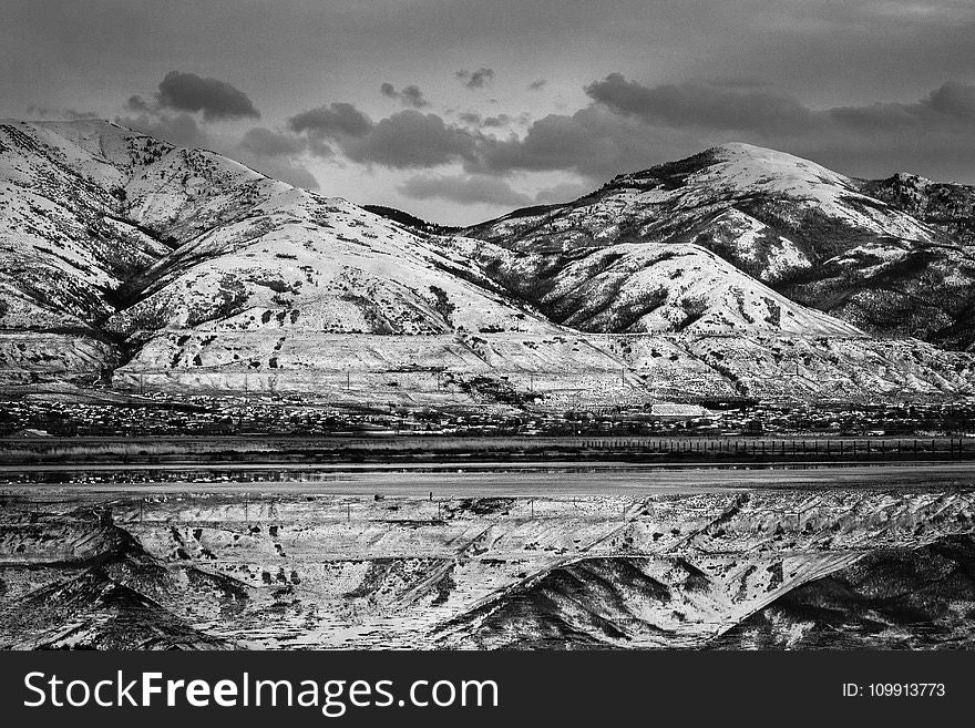 Grayscale Photo of a Landscape View of Mountains