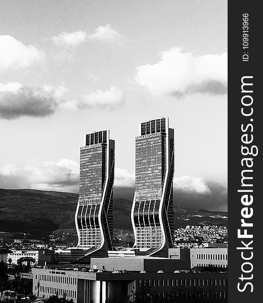 Greyscale Photography of Two High Rise Buildings