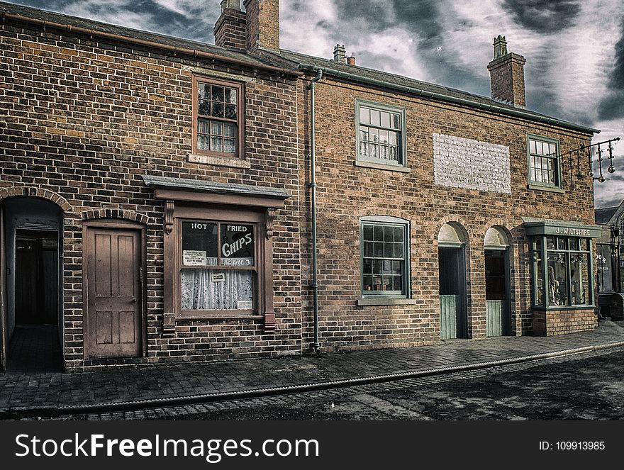 Architectural Photography of Brown Brick Building