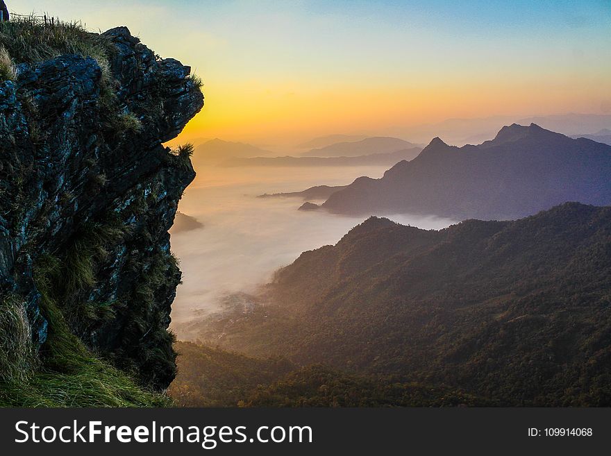 Foggy Mountains at Sunset