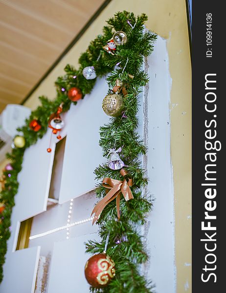 Photo of Green Garland With Bold Bauble Decor