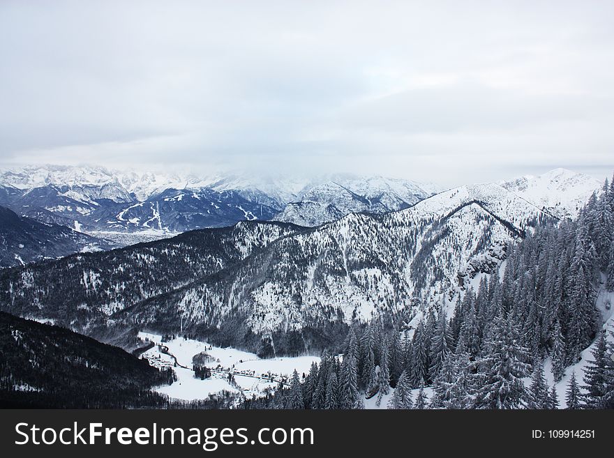 Scenic View Of Mountains Covered With Snow