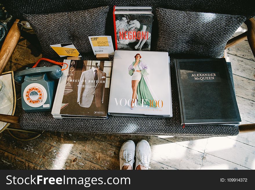 Photography Of Magazines At The Couch