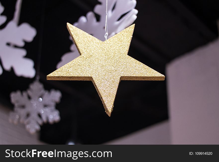 Close-up Photography Of Star Covered With Glitters