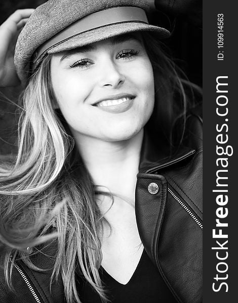 Grayscale Photography of Woman Wearing Hat