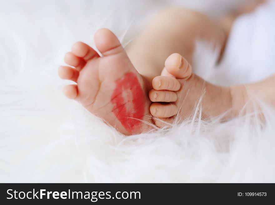 Baby Foot With Red Kiss Mark