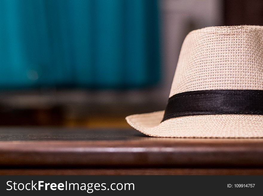 Selective Focus Photo Of Brown Fedora Hat