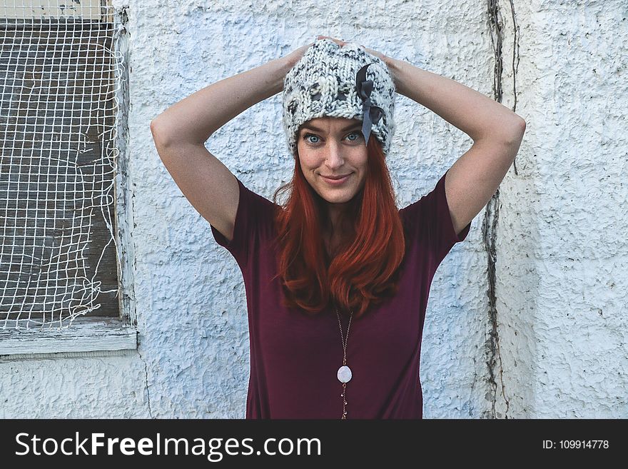 Red Haired Woman Wearing Purple T-shirt
