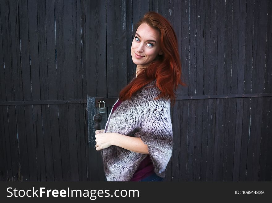 Woman Wearing Grey Printed Poncho Posing for Photo