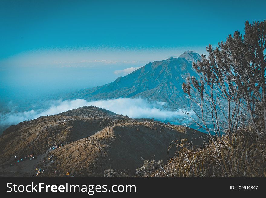 Landscape Photography of Mountain Surrounded by Sea of Clouds