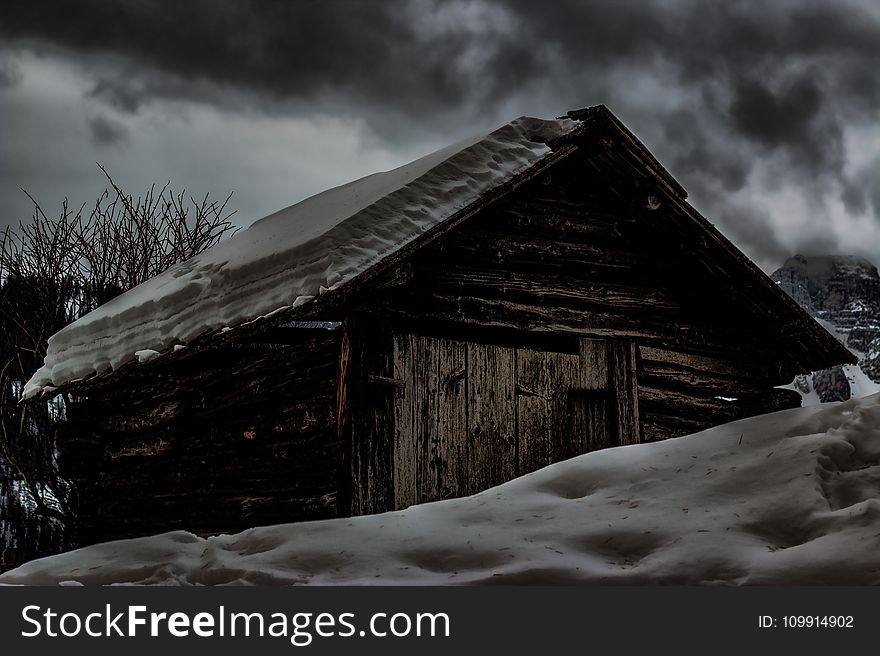Cabin Covered by Snow