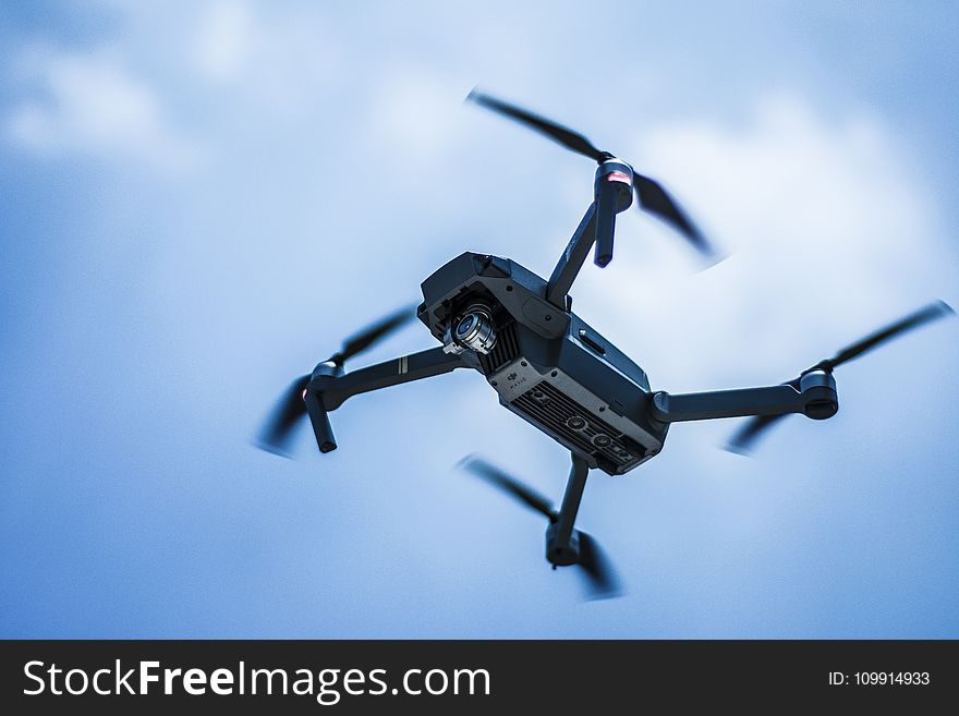 Photo of Gray Quadcopter on the Sky