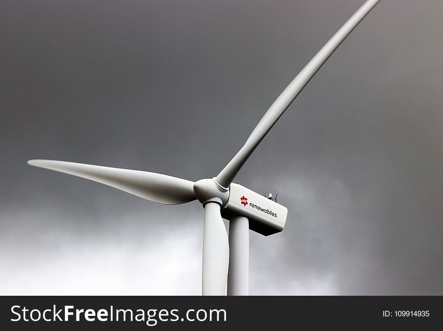 White 3-blade Windmill Under Cloudy Sky