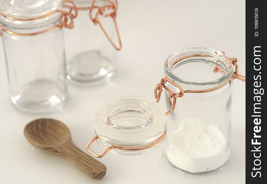 Two Clear Glass Jars