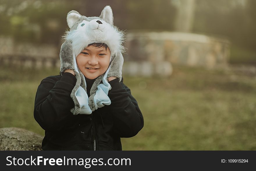 Boy Wearing Gray-and-white Cap