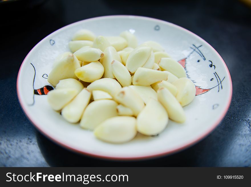Garlic in White Ceramic Plate