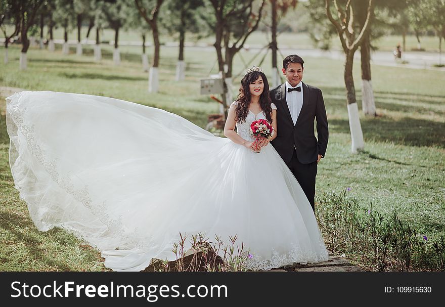 Selective Focus Photography of Groom and Bride