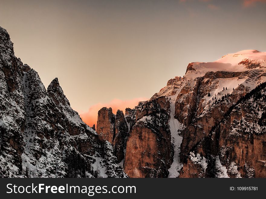 Brown and Gray Snow-covered Mountains