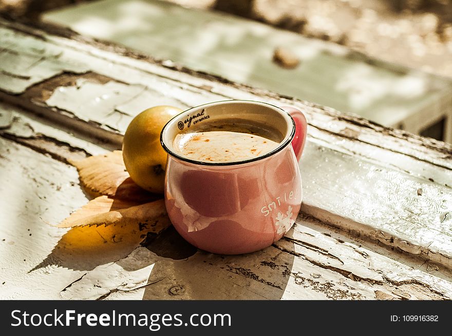 Brown Liquid on Pink Ceramic Mug