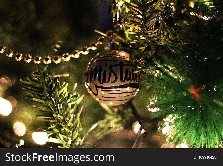 Gold Printed Bauble On Christmas Tree