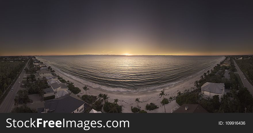 Panoramic Photography of Beach during Golden Hour