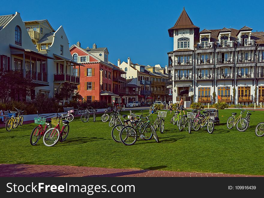Bicycle Lot on Green Field