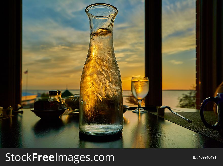 Clear Wine Glass And Clear Glass Pitcher