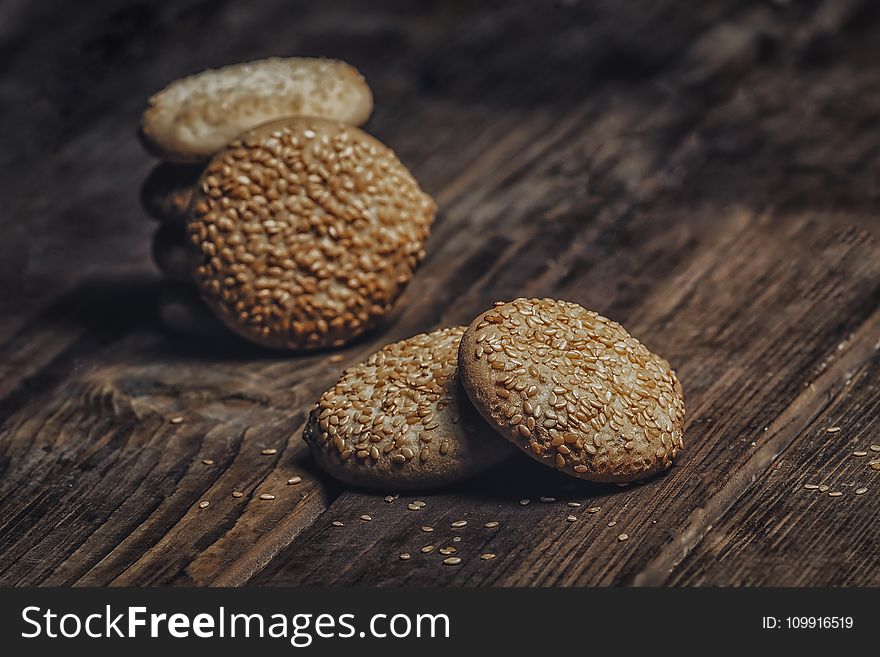 Photography Of Pile Of Cookies With Sesame Seeds On Table