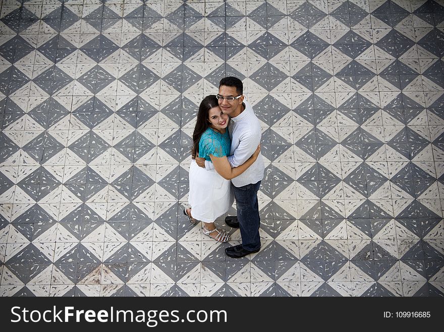 Photography of Couple Hugging Each Other
