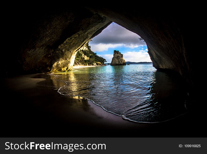 Gray and Brown Cave Near on the Ocean